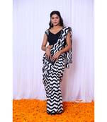 Black and white printed saree with hand embroidered blouse