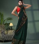 Bottle green cotton jacquard border handloom saree
