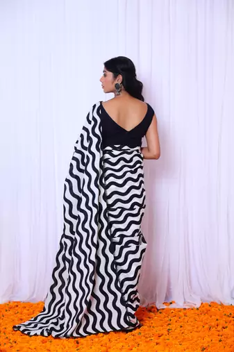 Black and white printed saree with hand embroidered blouse