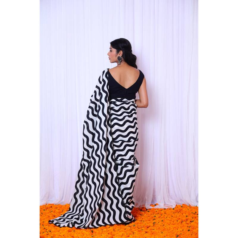 Black and white printed saree with hand embroidered blouse