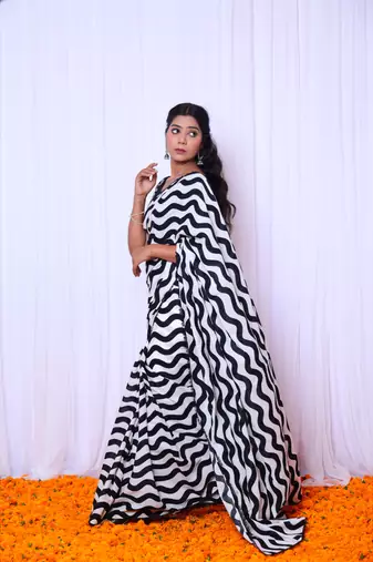 Black and white printed saree with hand embroidered blouse