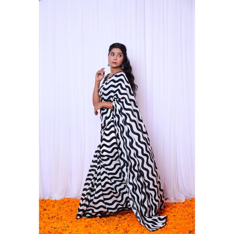 Black and white printed saree with hand embroidered blouse