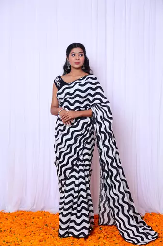 Black and white printed saree with hand embroidered blouse