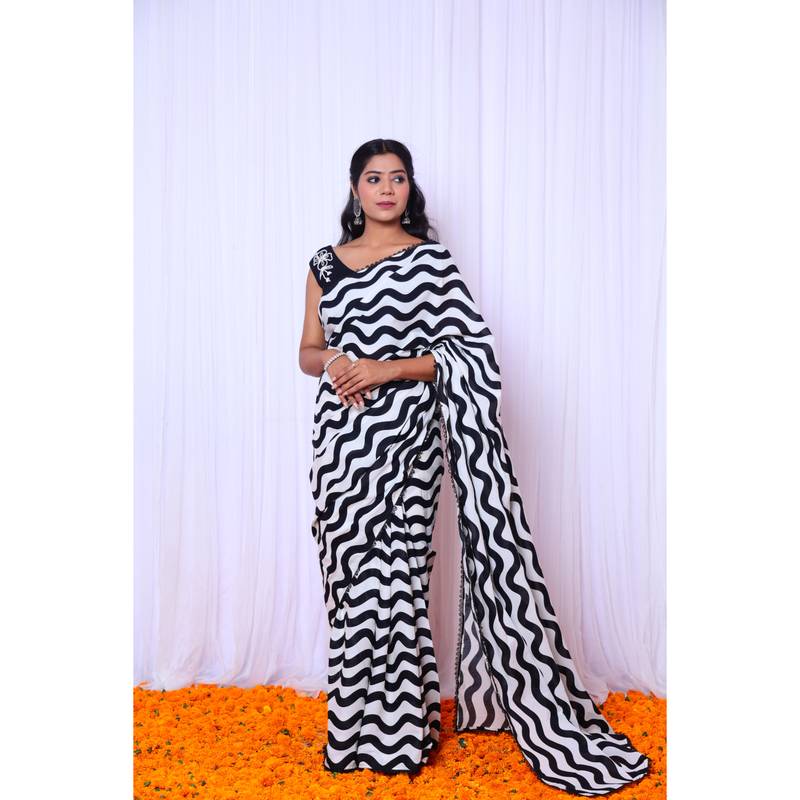Black and white printed saree with hand embroidered blouse