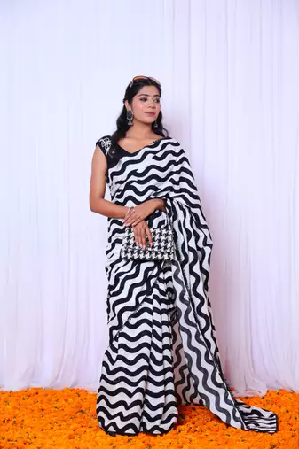 Black and white printed saree with hand embroidered blouse
