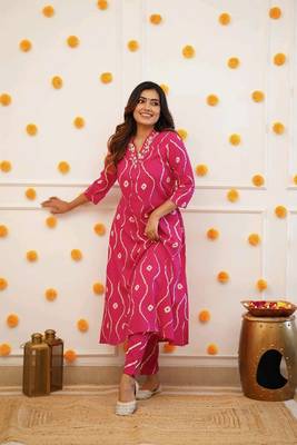 Pink colour traditional looking smart printed kurti with embroidered neck 1