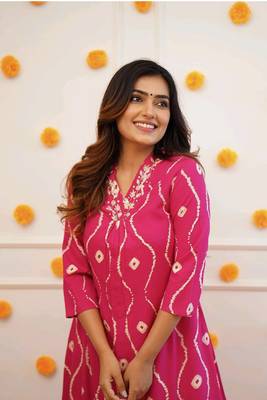 Pink colour traditional looking smart printed kurti with embroidered neck 4