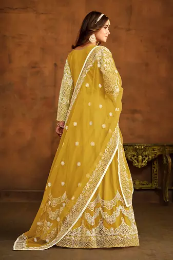 Yellow net floor length salwar kameez