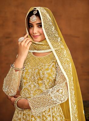 Yellow net floor length salwar kameez 4