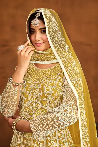 Yellow net floor length salwar kameez