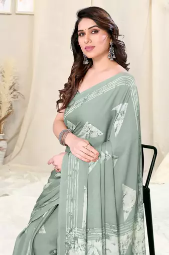 Pastel teal chiffon block print saree with unstitched blouse piece