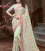 Green Zari Resham Embroidered Georgette Designer Saree With Blouse Piece