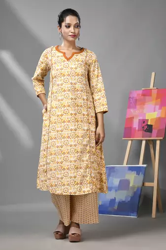 White & mustard yellow cotton kurta & palazzo set with ethnic prints