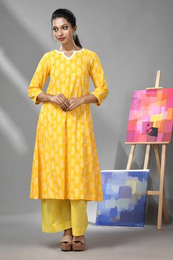 Yellow cotton kurta & palazzo set with ethnic prints