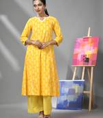 Yellow cotton kurta & palazzo set with ethnic prints