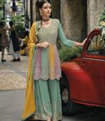 Green chinon  embroidery work full stiched  suit set