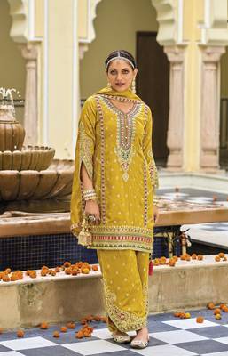 Yellwo silk with embroidery work full stiched  suit set 1