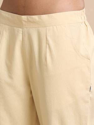 Hassu's women beige cotton solid regular fit ankle length pants 5