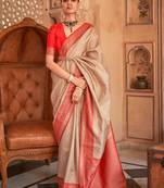 Beige & red color Banarasi silk blend woven saree with blouse