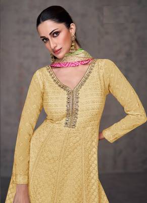 Light yellow pure georgette heavy embroidery semi stitched gowns 1