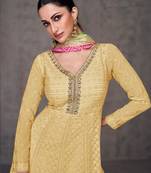 Light yellow pure georgette heavy embroidery semi stitched gowns