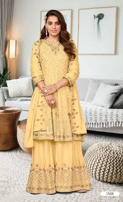 Yellow chinon with embroidery work full stiched  suit set 1