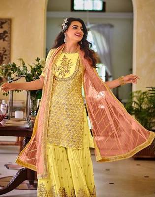 Yellwo  faux georgette with embroidery work full stiched  suit set 2