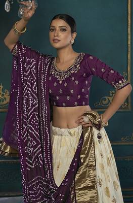 Cream color woven and embroidered dola silk lehenga choli 3