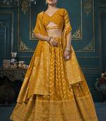 Mustard color woven and embroidered dola silk lehenga choli
