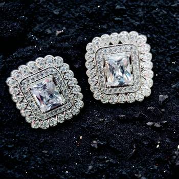 white gleaming moonstone shimmers studs 1