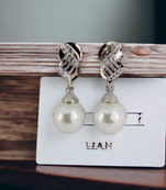 pearl symphony earrings in rhodium white