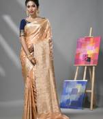 Peach katan silk banarasi saree with ethnic motifs and zari woven designs