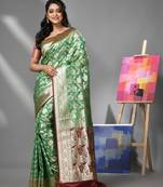 Green silk banarasi saree with zari woven designs