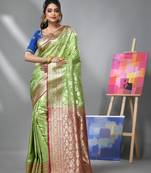 Light green silk banarasi saree with zari woven designs