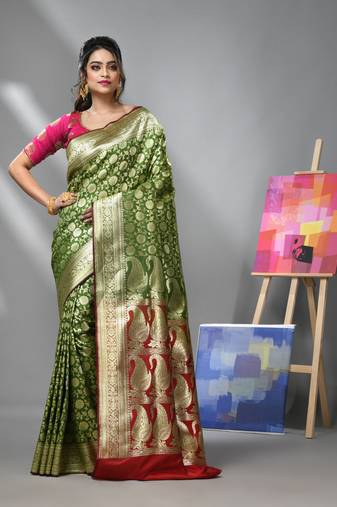 Pear green silk banarasi saree with zari woven floral and paisley designs