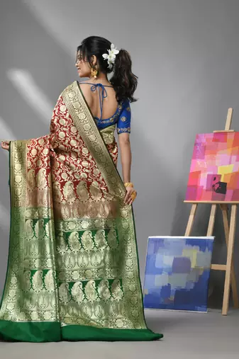 Cherry red silk banarasi saree with zari woven designs