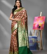 Ruby red silk banarasi saree with zari woven designs
