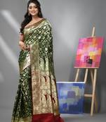 Dark green silk banarasi saree with zari woven floral and paisley designs