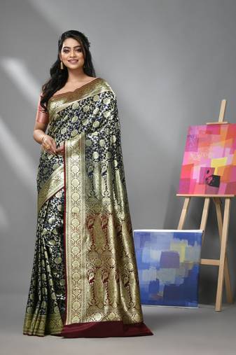 Blue silk banarasi saree with zari woven floral and paisley designs