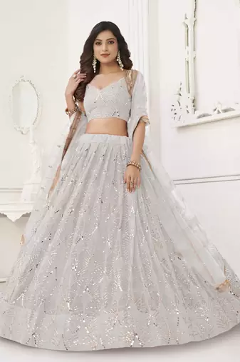 OFF WHITE  NET FABRIC LEHENGA CHOLI WITH SEQUINS AND THREAD EMBROIDERY WORK