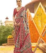 Off white & maroon colour printed patola silk blend saree with blouse