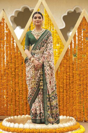 Cream & dark green colour printed patola silk blend saree with blouse