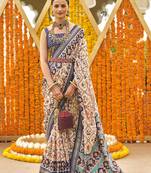Off white & navy blue colour printed patola silk blend saree with blouse