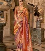 Orange & maroon Banarasi silk blend zari woven saree with blouse