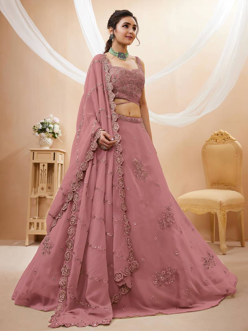 Attractive Peach Sequins Georgette Party Wear Lehenga Choli