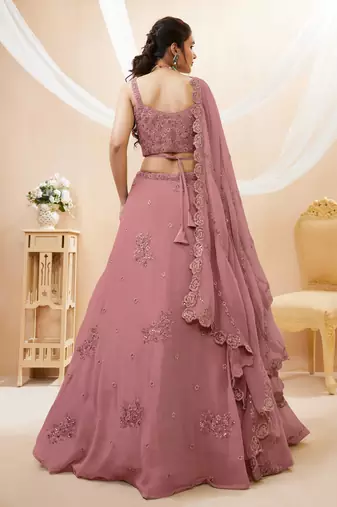 Attractive Peach Sequins Georgette Party Wear Lehenga Choli