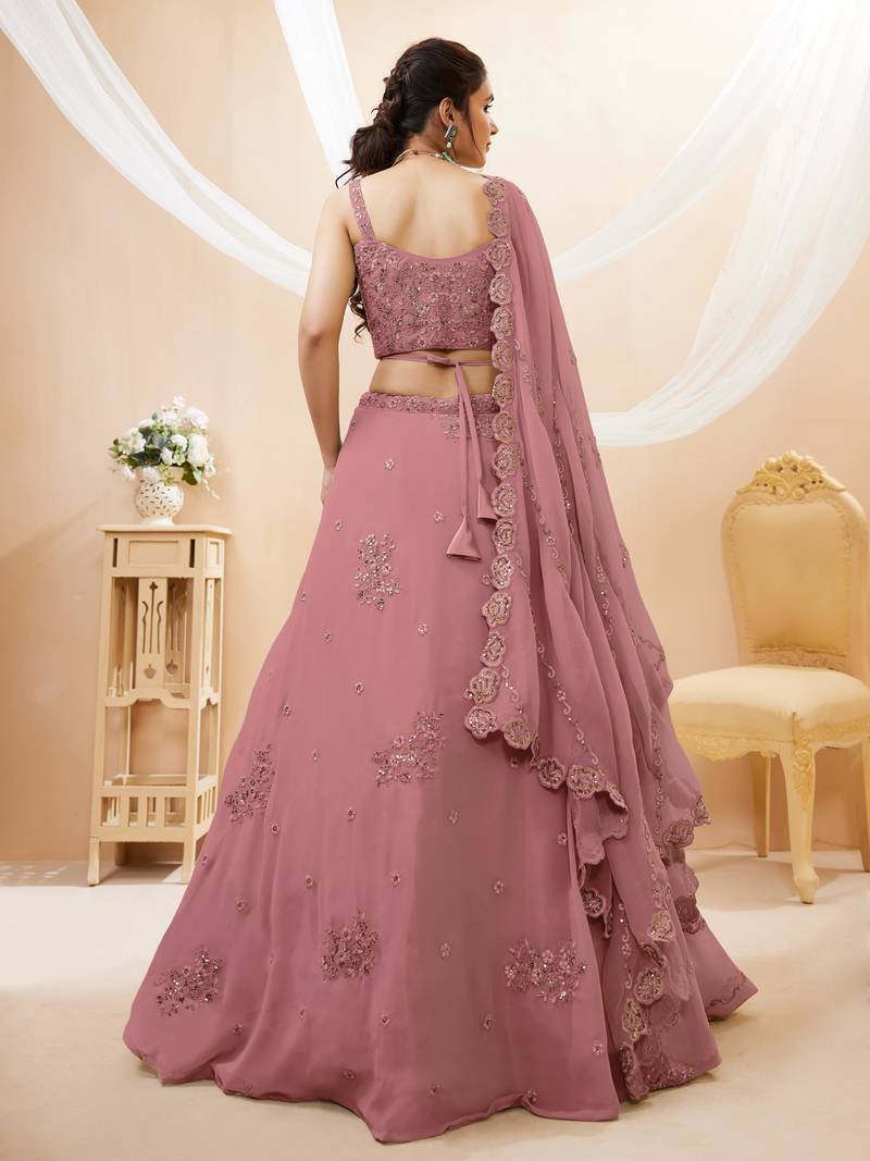 Attractive Peach Sequins Georgette Party Wear Lehenga Choli