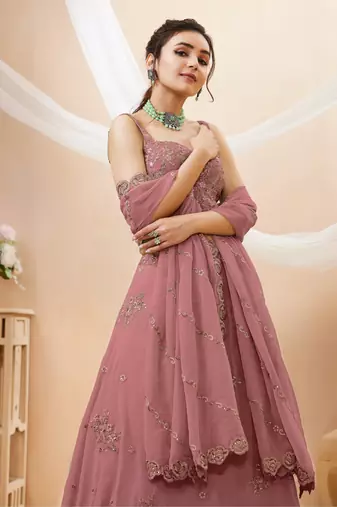 Attractive Peach Sequins Georgette Party Wear Lehenga Choli