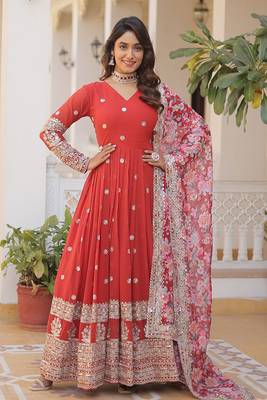 Smart and stylish orange colour heavy partywear gown with dupatta 1