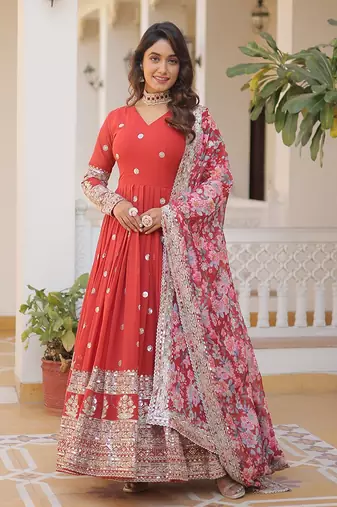 Smart and stylish orange colour heavy partywear gown with dupatta